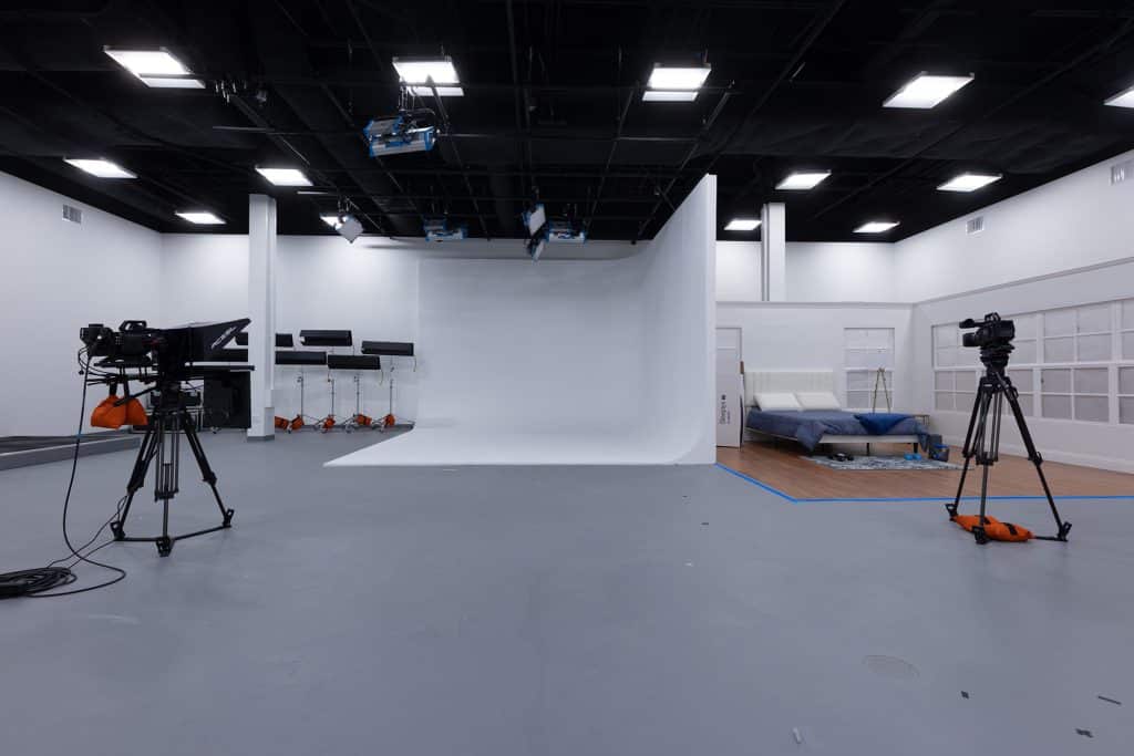 Cyclorama and bedroom set in studio designed and built by Ball Media