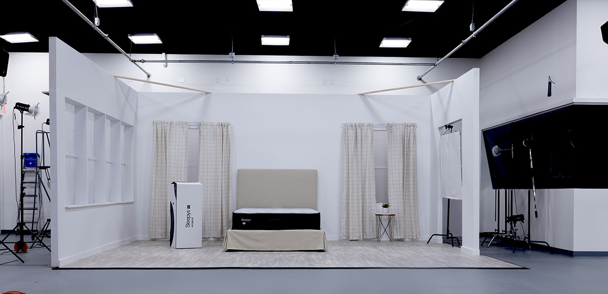 A set designed specifically for a large product - Mattresses - on a set built for Mattress Firm.