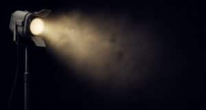 Studio spotlight illuminating a professional video production space