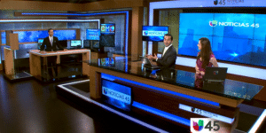 Noticias 45 Houston television news studio with anchors at broadcast desk
